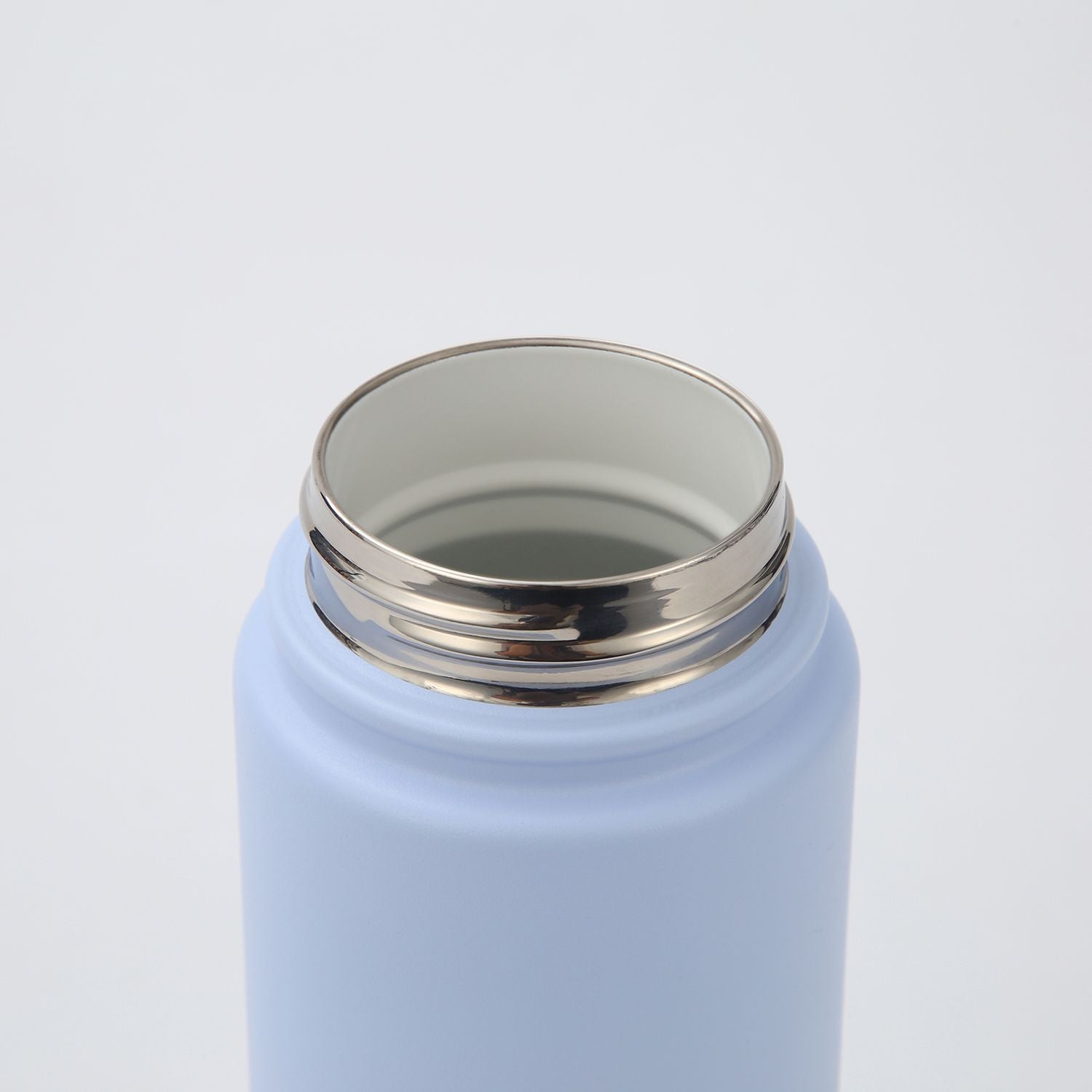 Crossing Urban Ceramic S/S Insulated Flat Cap Bottle With Handle 600ML - Skyline Singapore (Sky Blue)