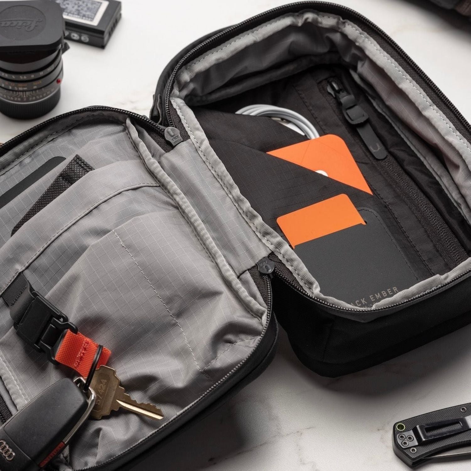 Black Ember (Limited Edition) Kompak Sling Bag 5L - Ember Orange